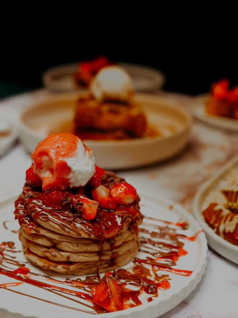 Berry Me in Chocolate Stacked Pancakes with fresh berries and gelato